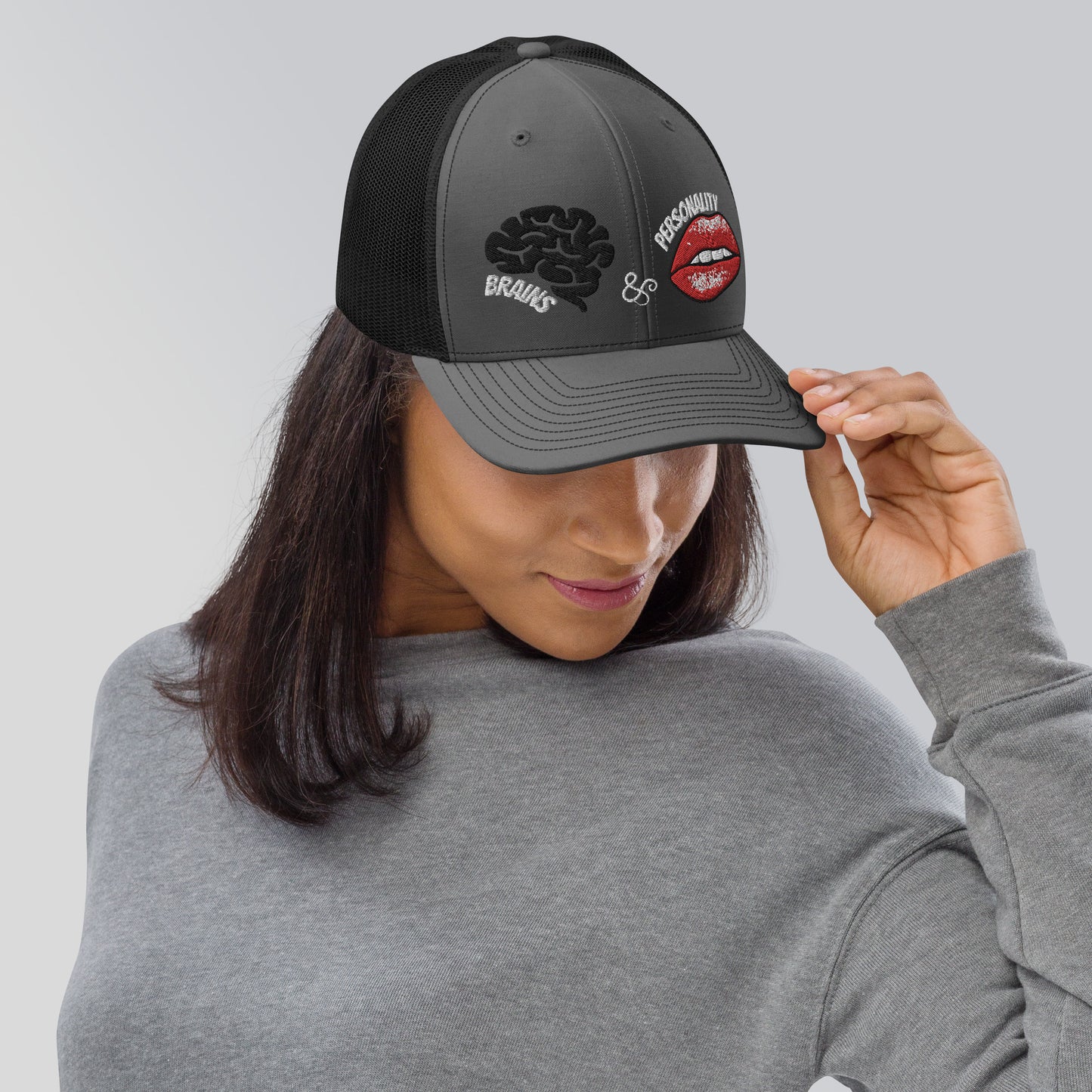 embroidered cap with brains and personality