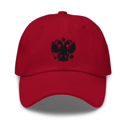 red baseball cap with black russian coat of arms embroidered in center