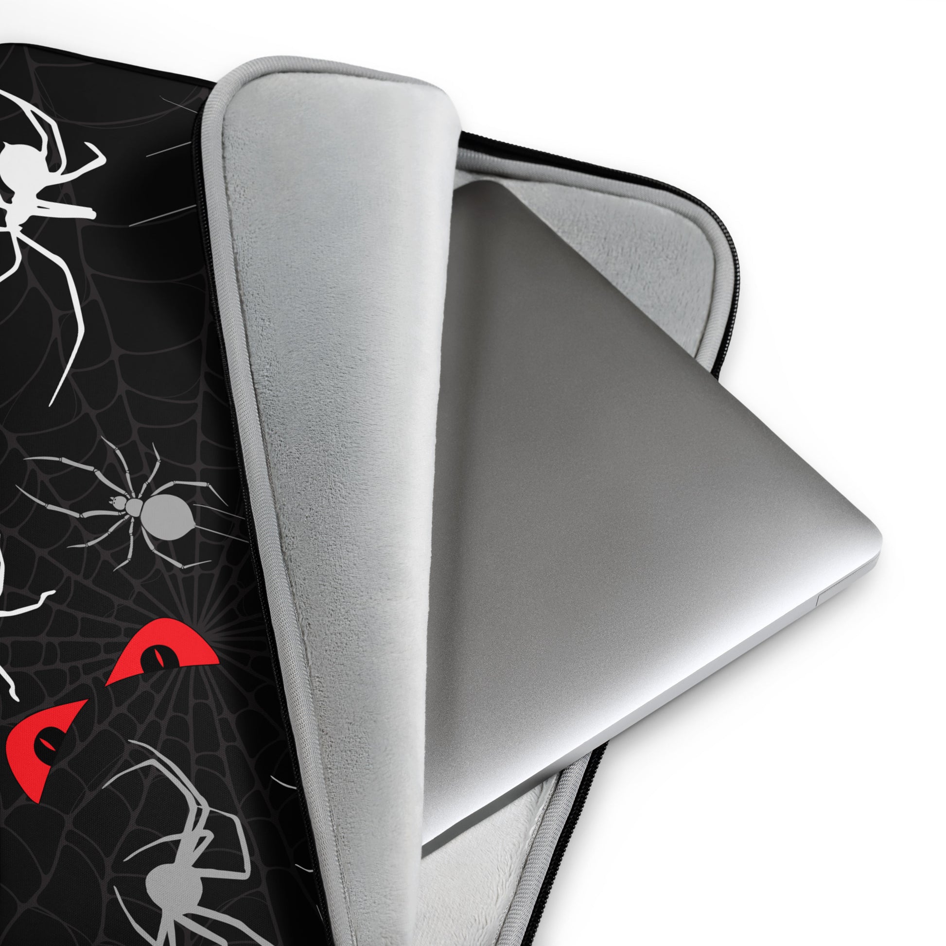 13 inch laptop sleeve with spiders, spider webs, and creepy red eyes. Perfect for Halloween.