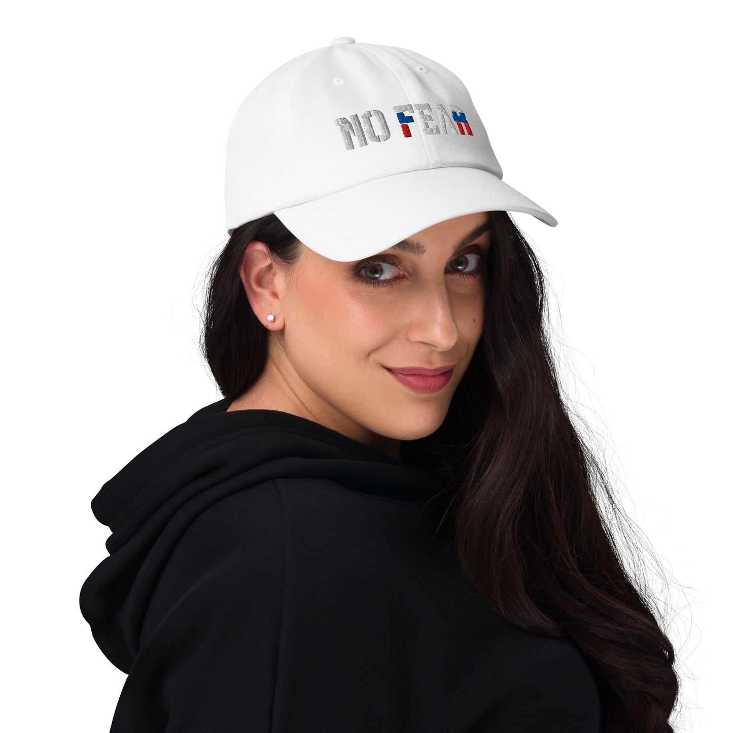 NO FEAR Russian streetwear cap styled with minimalist outfit, showing white, blue, and red embroidery.
