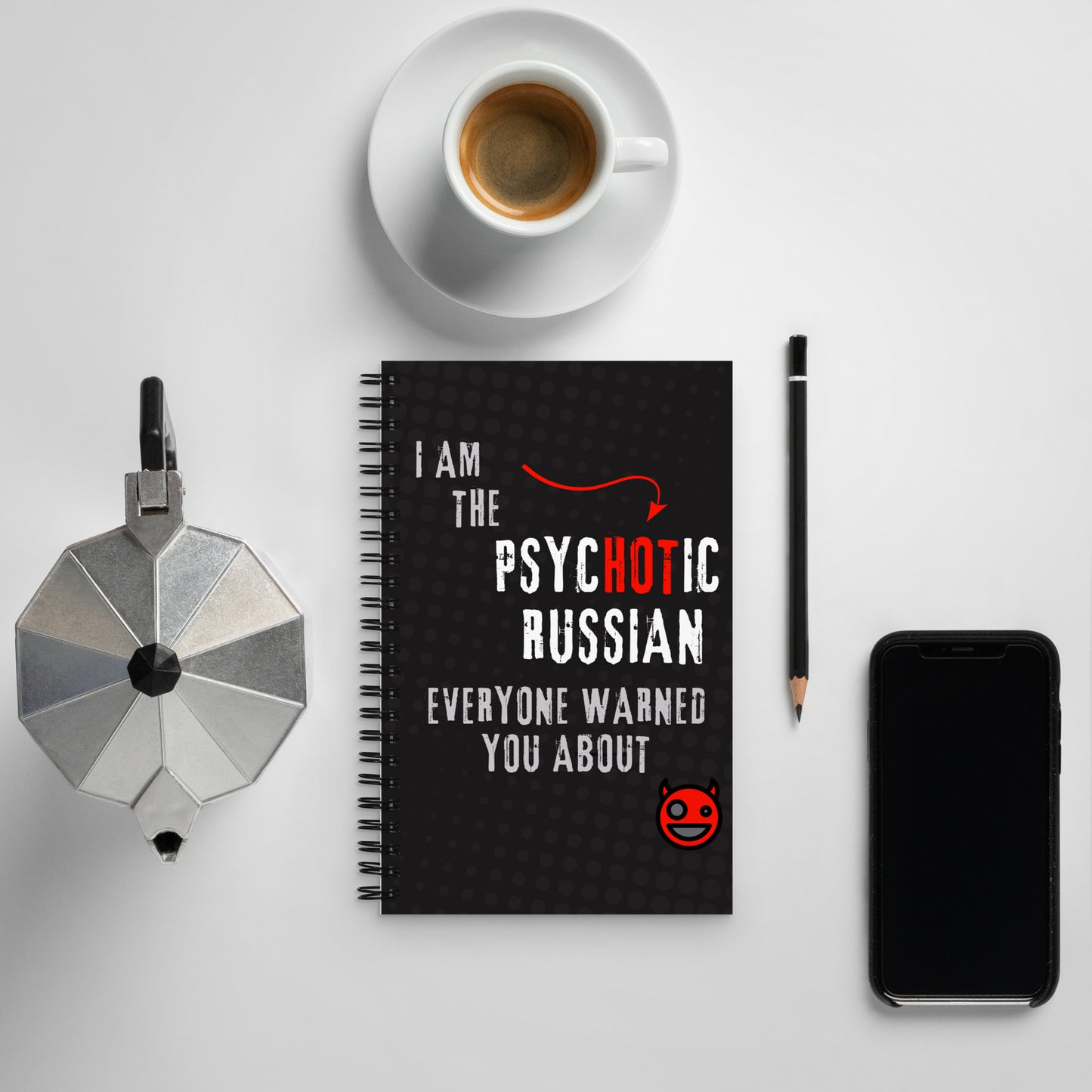 Spiral notepad with text 'I Am the Psychotic Russian Everyone Warned You About' and red devil graphic.