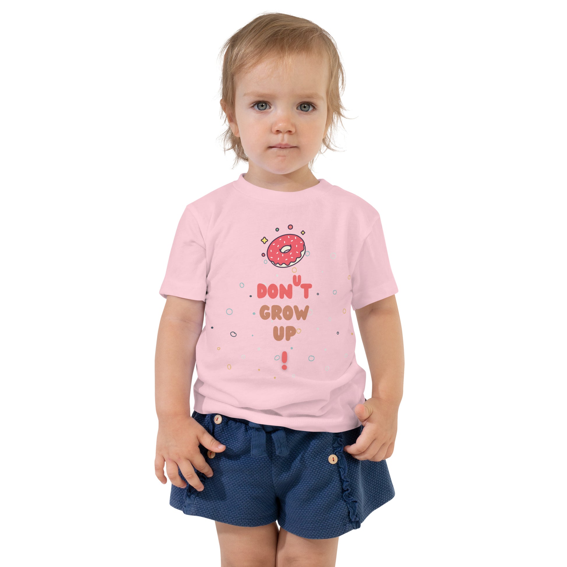 toddler t-shirt with a donut and caption "don't grow up!"