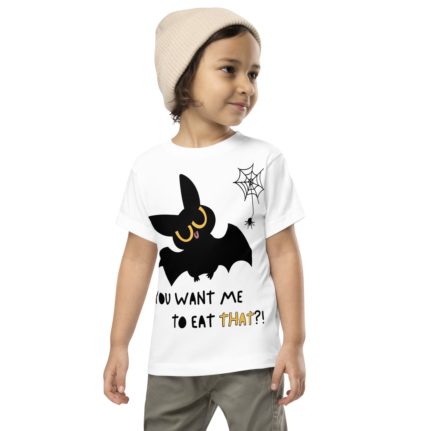 Toddler in a white cotton t-shirt with a cute bat next to a spider hanging off a spiderweb and caption "You Want Me To Eat THAT?!"