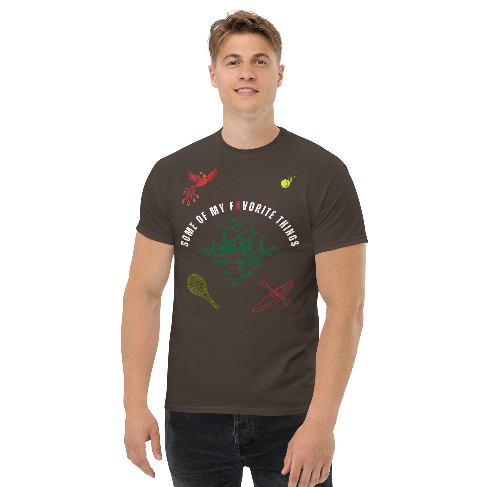 man in dark chocolate brown t-shirt with some of my favorite things inscribed in the center, russian firebird, tennis ball, tennis racket, kayak, camper van, nature scene