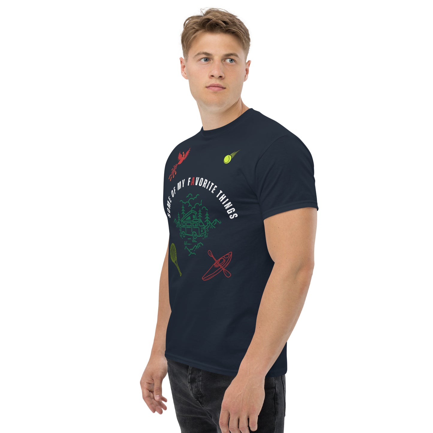 man in navy blue t-shirt with some of my favorite things inscribed in the center, russian firebird, tennis ball, tennis racket, kayak, camper van, nature scene