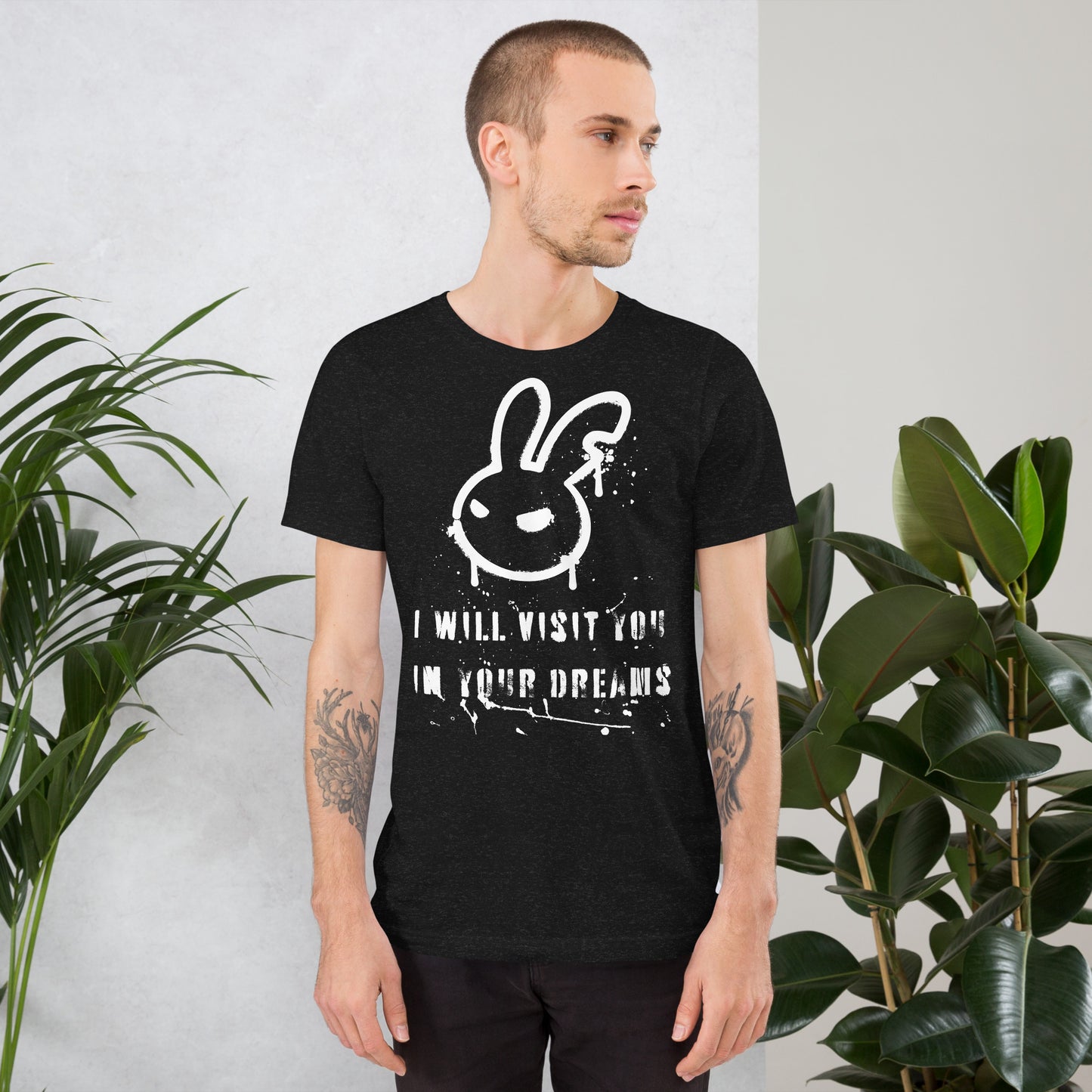 Man in black unisex t-shirt with a creepy caption "I Will Visit You In Your Dreams."