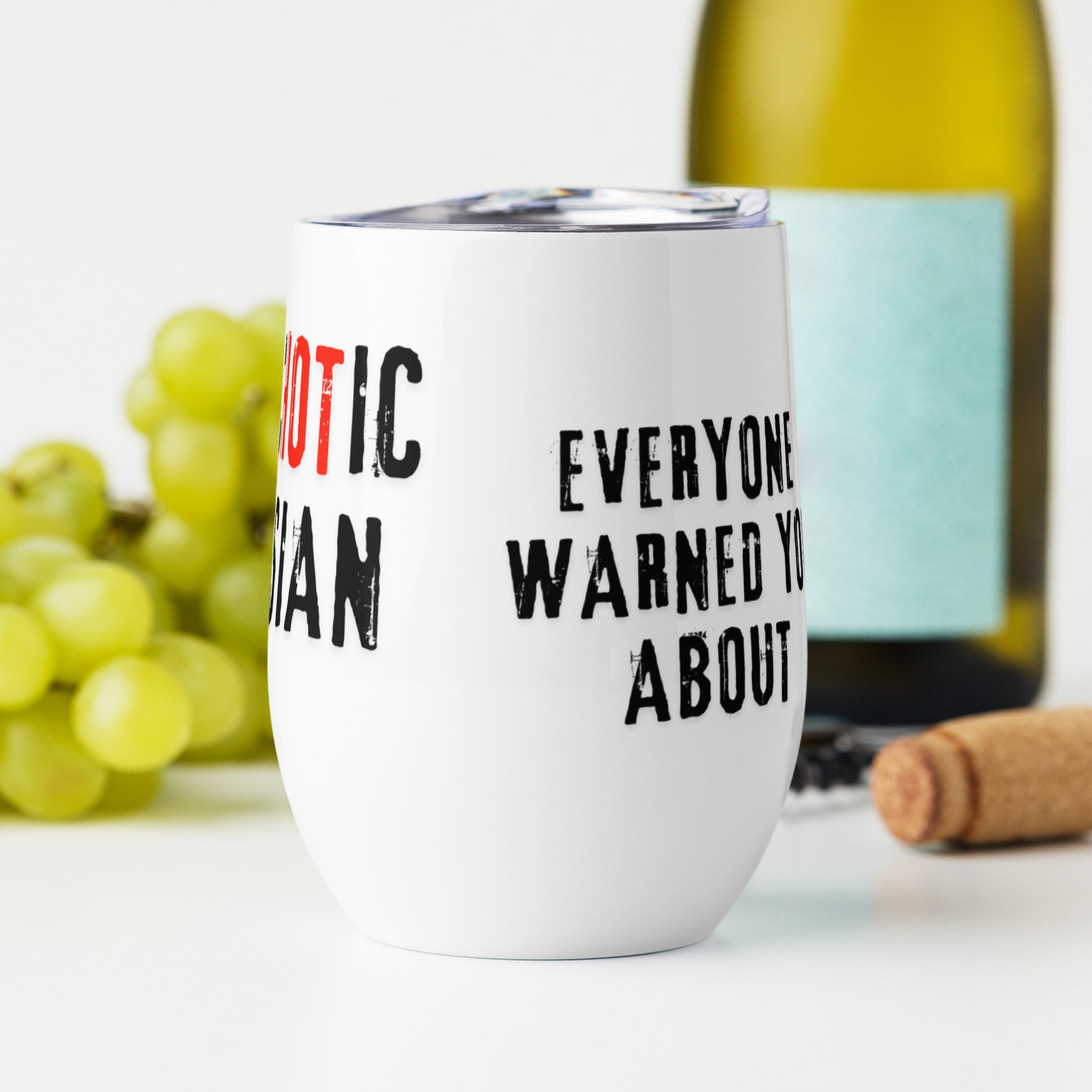 Stainless steel 12oz wine tumbler with text "I am the PsycHOTic Russian Everyone Warned You About" next to a bottle of wine. Double-wall insulated for hot or cold drinks.