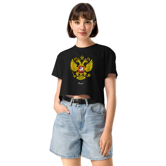 woman in black tshirt with russian crest coat of arms on the front