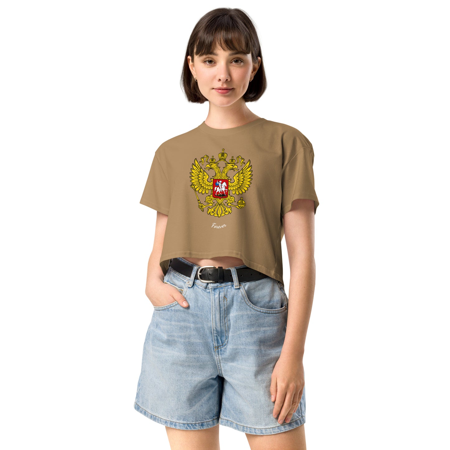 woman in camel color tshirt with russian crest coat of arms on the front