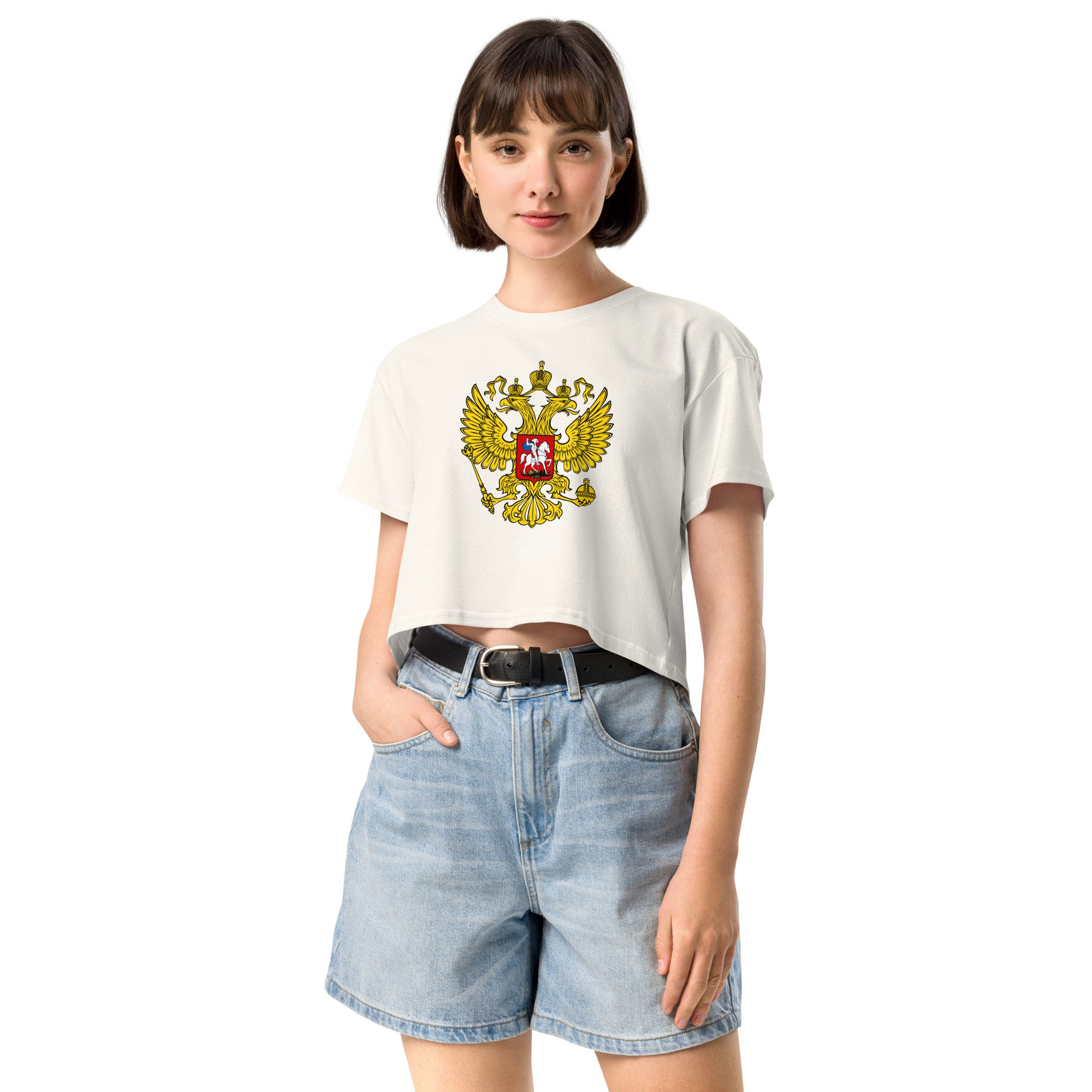 woman in ecru color tshirt with russian crest coat of arms on the front