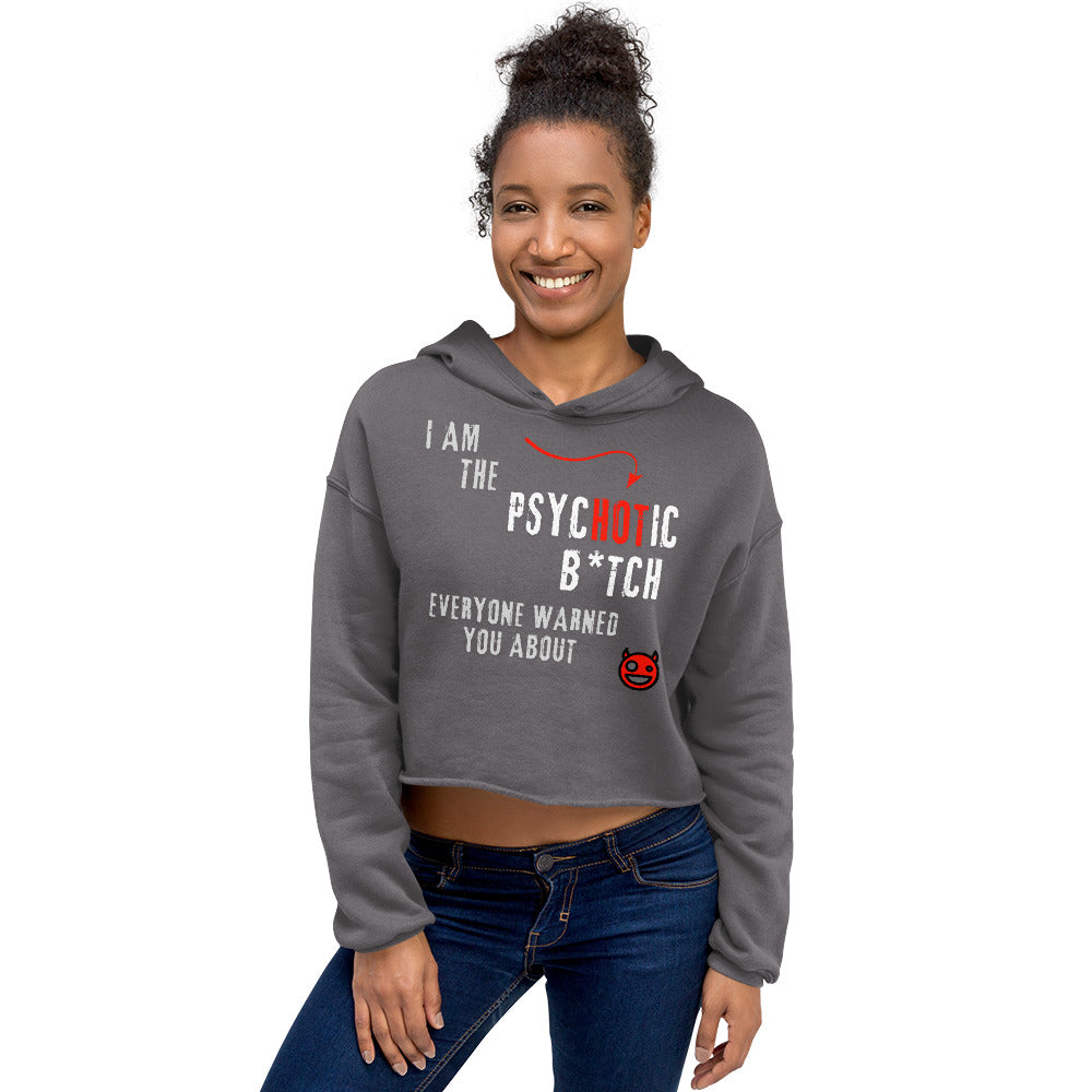 Woman in grey crop hoodie with "I am the Psychotic B*tch Everyone Warned You About" caption.