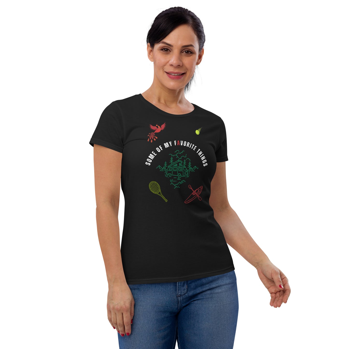 woman in black t-shirt with some of my favorite things inscribed in the center, russian firebird, tennis ball, tennis racket, kayak, camper van, nature scene