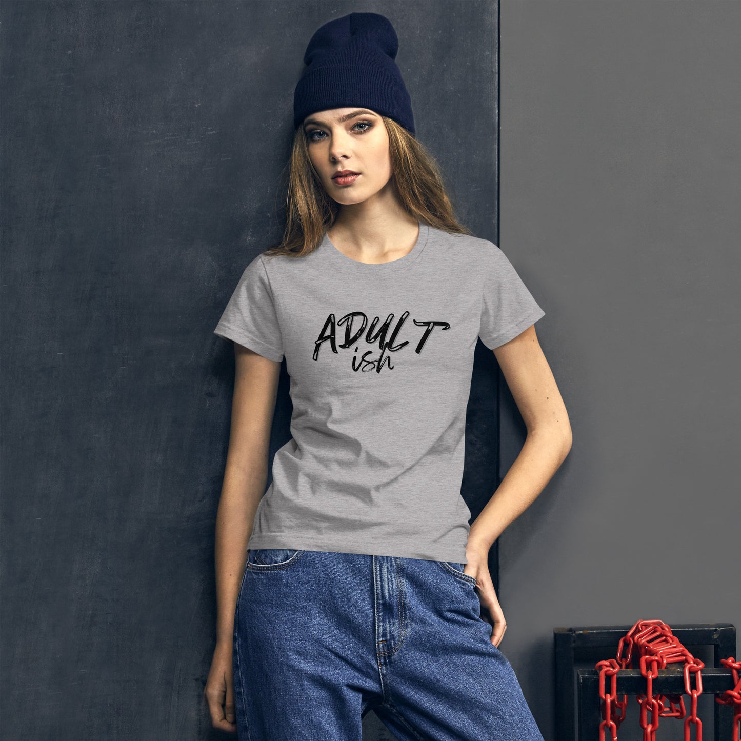 Woman in a grey t-shirt with "Adult-ish" caption.