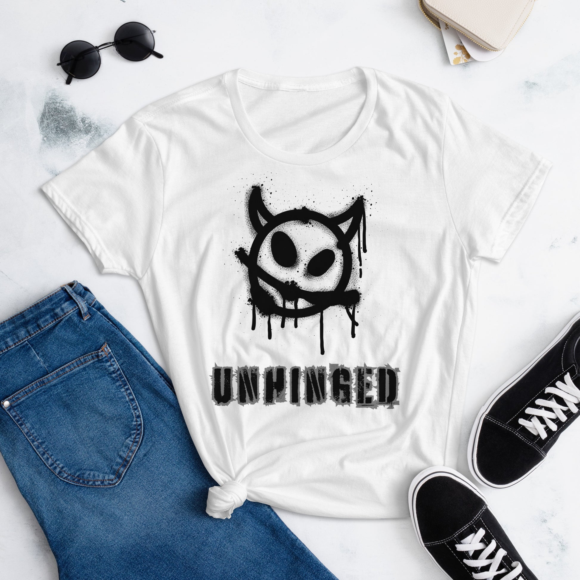 White cotton t-shirt with "Unhinged" caption.